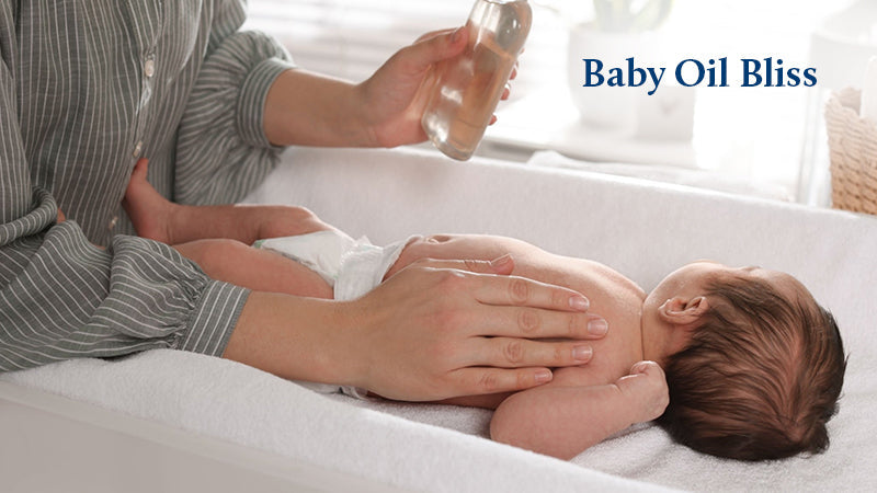 Mother is giving massage to baby from baby oil 